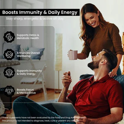 Couple enjoying coffee at home, with wellness benefits for immunity, energy, detox and focus shown.
